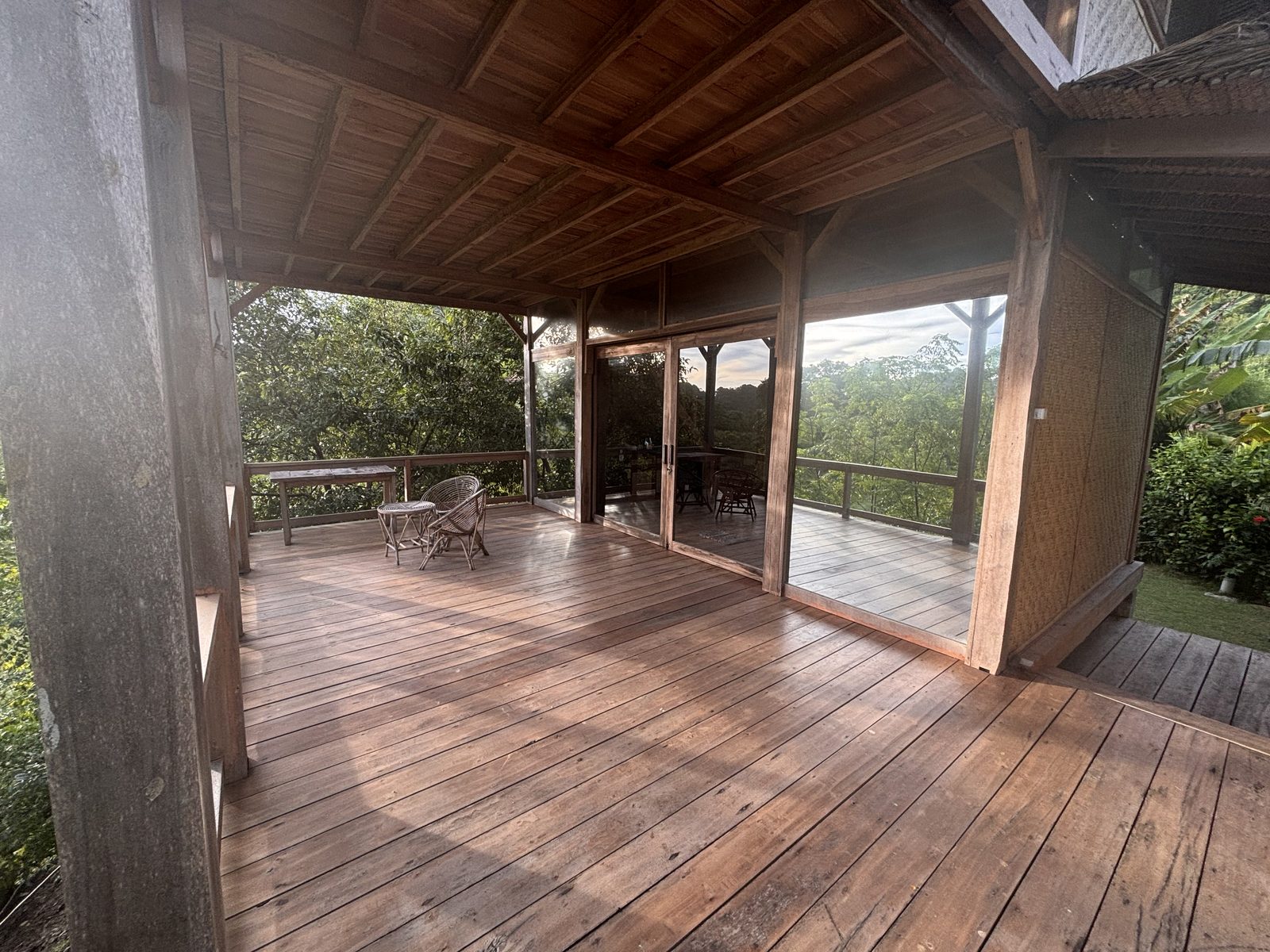 Wide deck terrace of the Big Bungalow with sliding doors to the upper floor