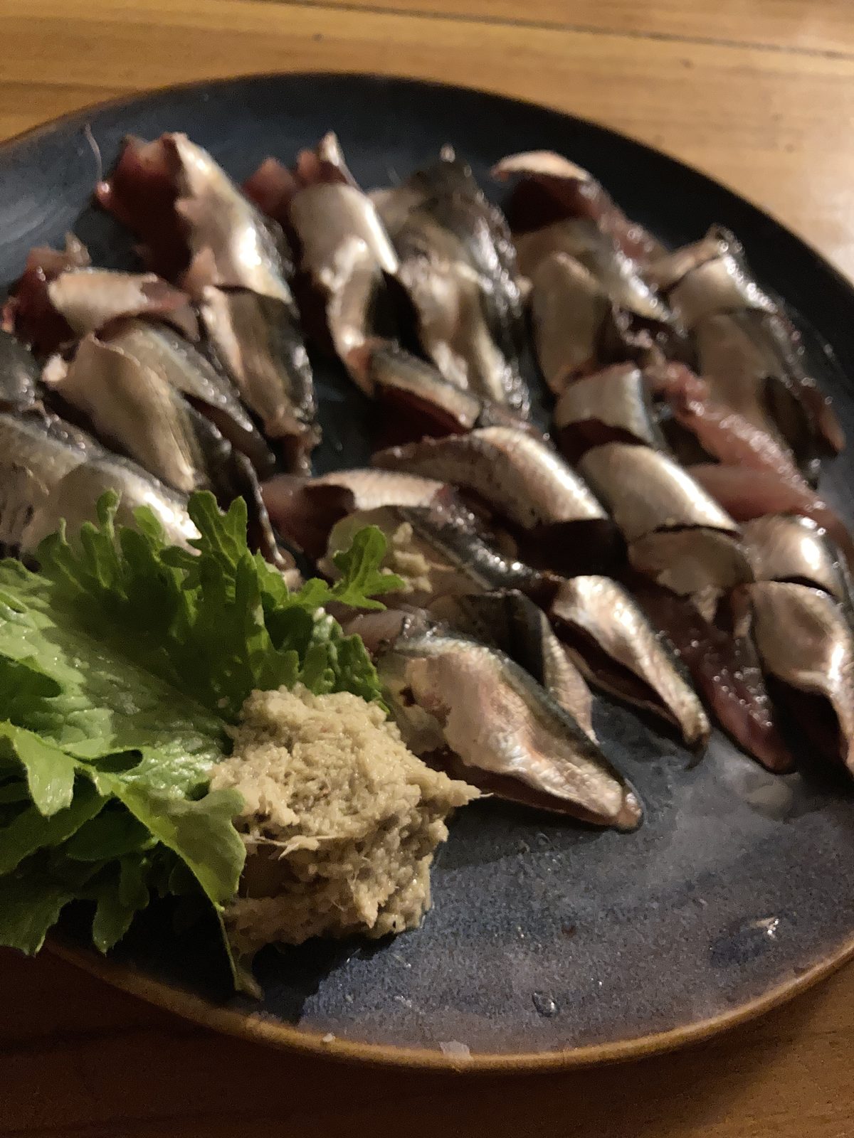 Local sardine-style sashimi with ginger at CintaDamai