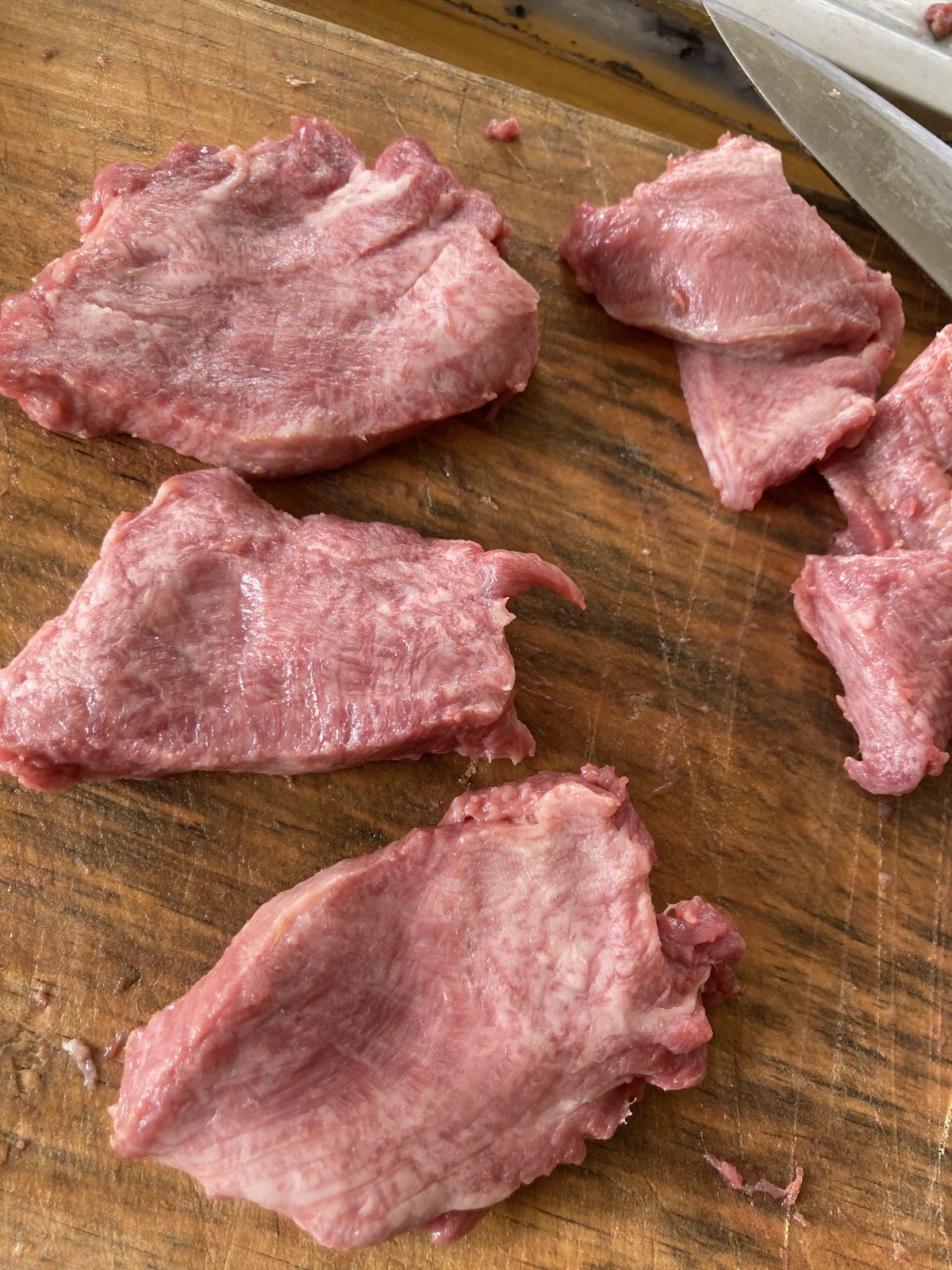 Hand-sliced fresh meat at CintaDamai
