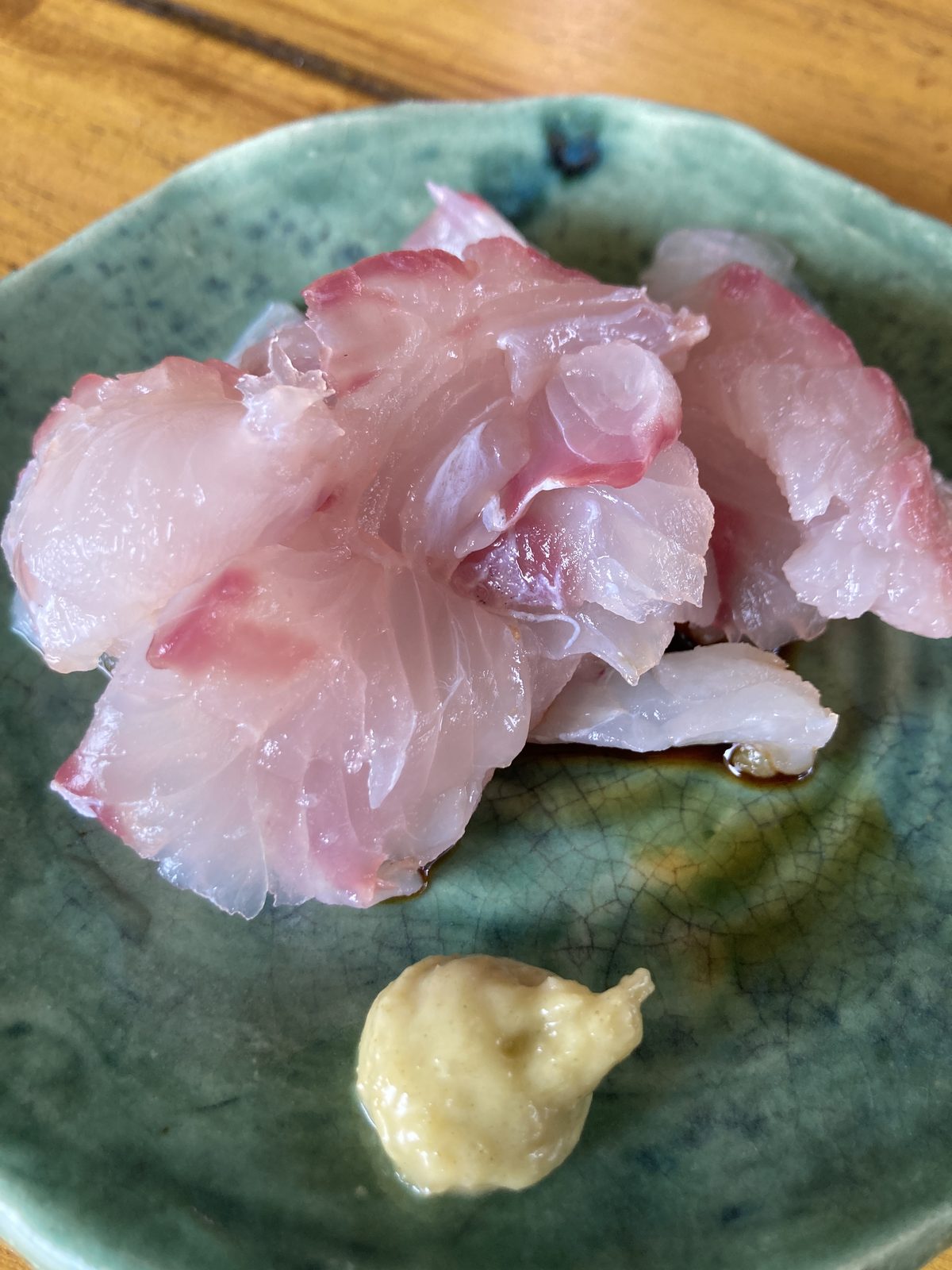 Fresh local snapper sashimi with karashi at CintaDamai