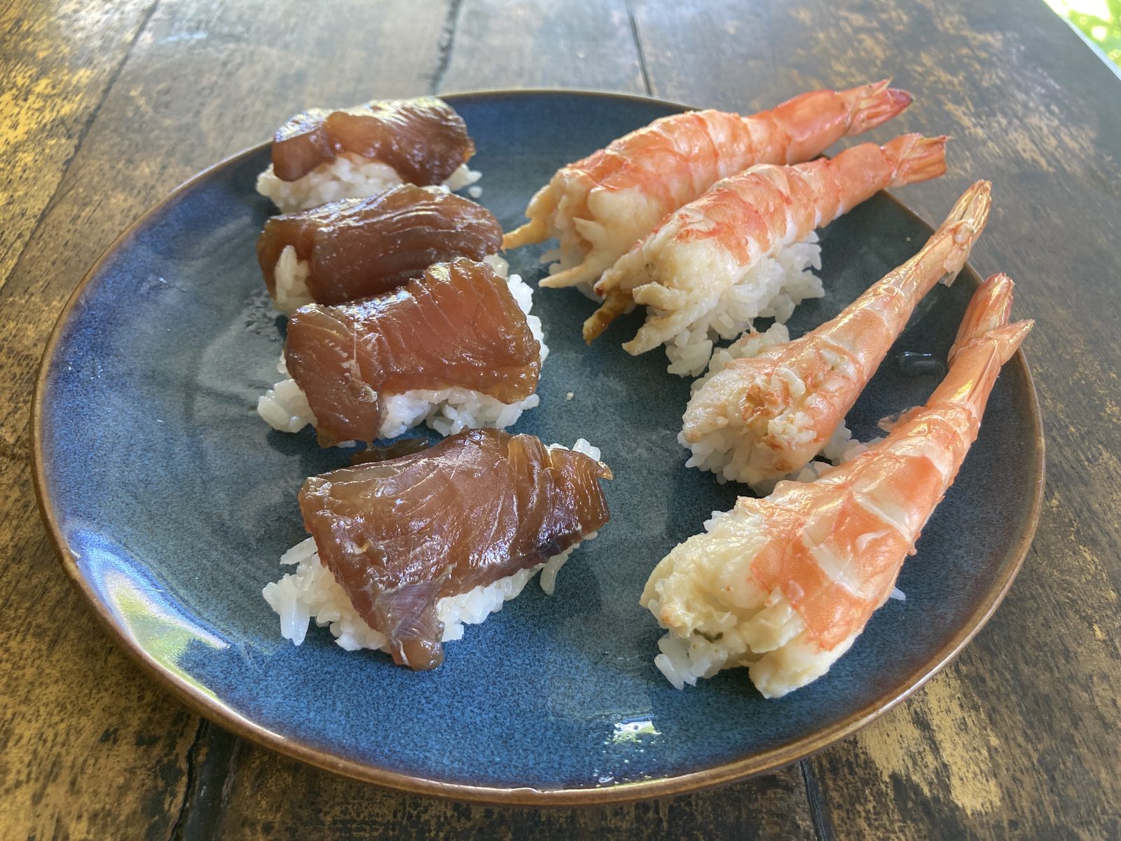 Soy-marinated tuna and prawn nigiri sushi at CintaDamai