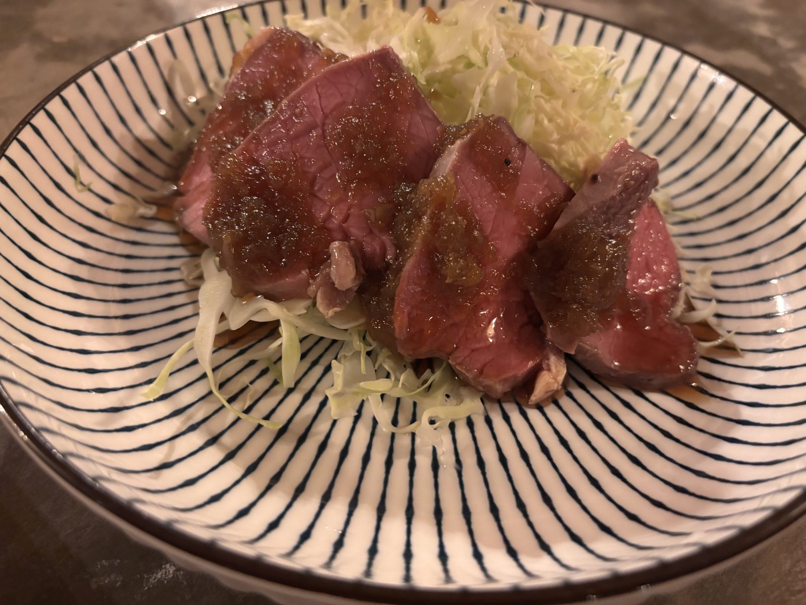 Beef tataki with onion ponzu sauce at CintaDamai
